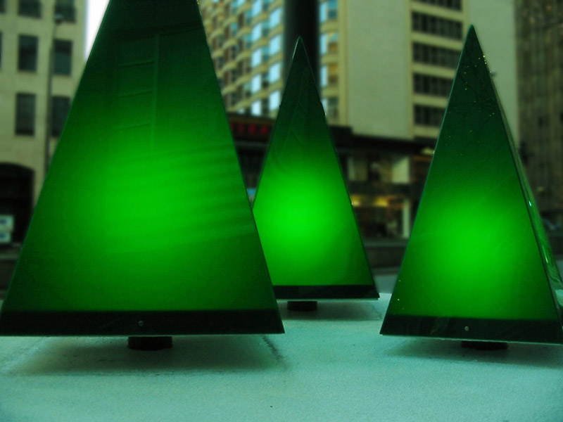 green plastic lighted trees