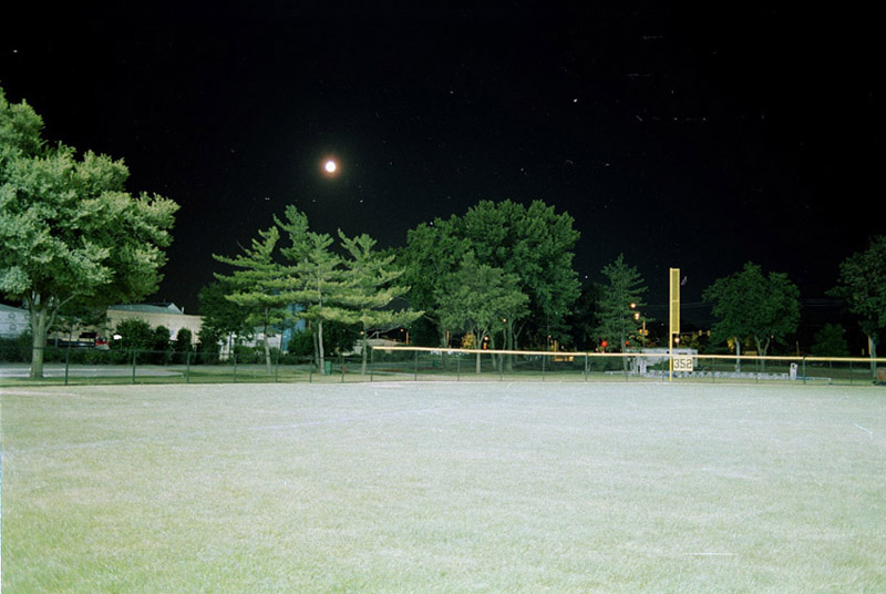 moon over baseball field