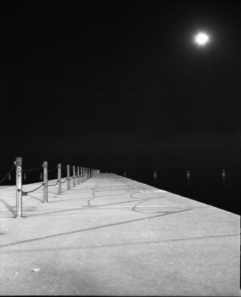 the moon over a jetty