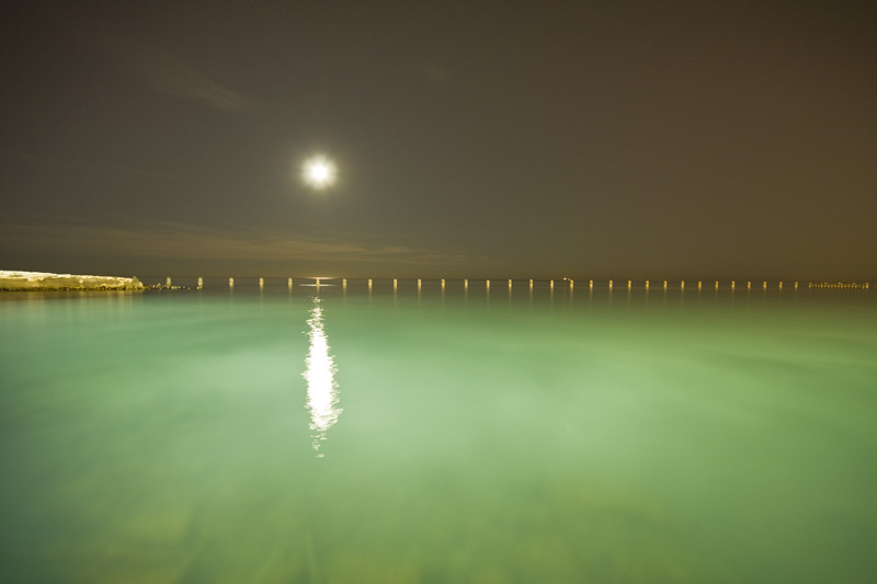moon over green water