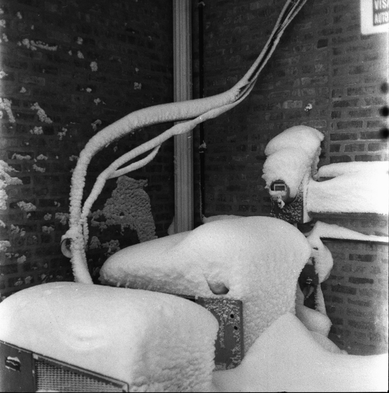 Snow Covered Air Conditioner