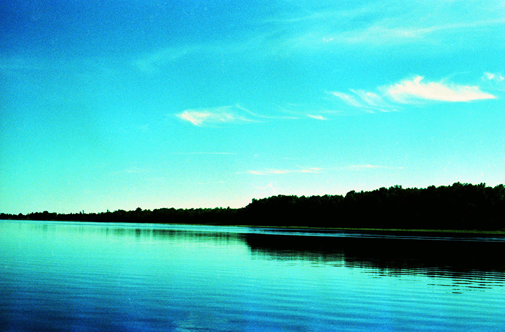 Still Lake and Shore near Dusk