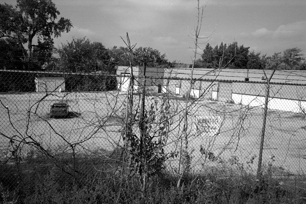 Fenced-Off Parking Lot 2