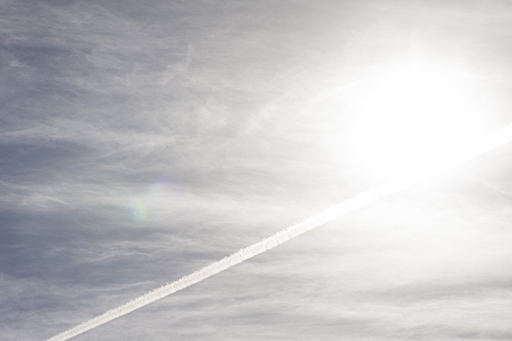 Contrail and Sun