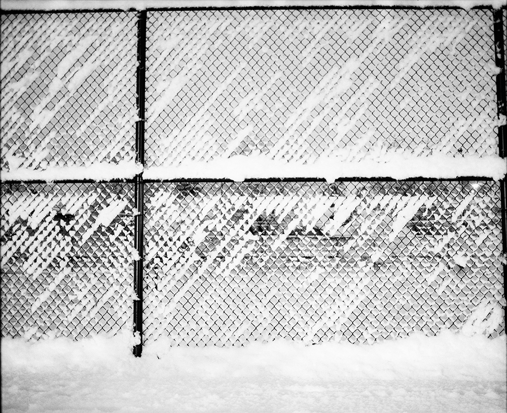Snow-Covered Chain-Link Fence