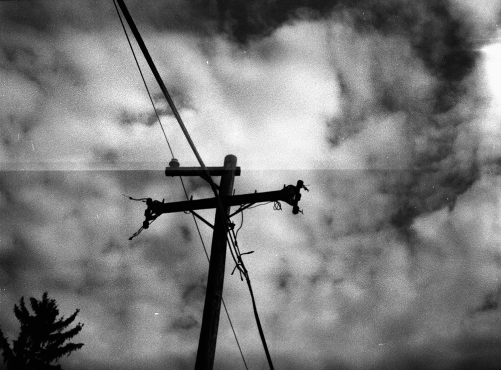 Utility Pole and Clouds